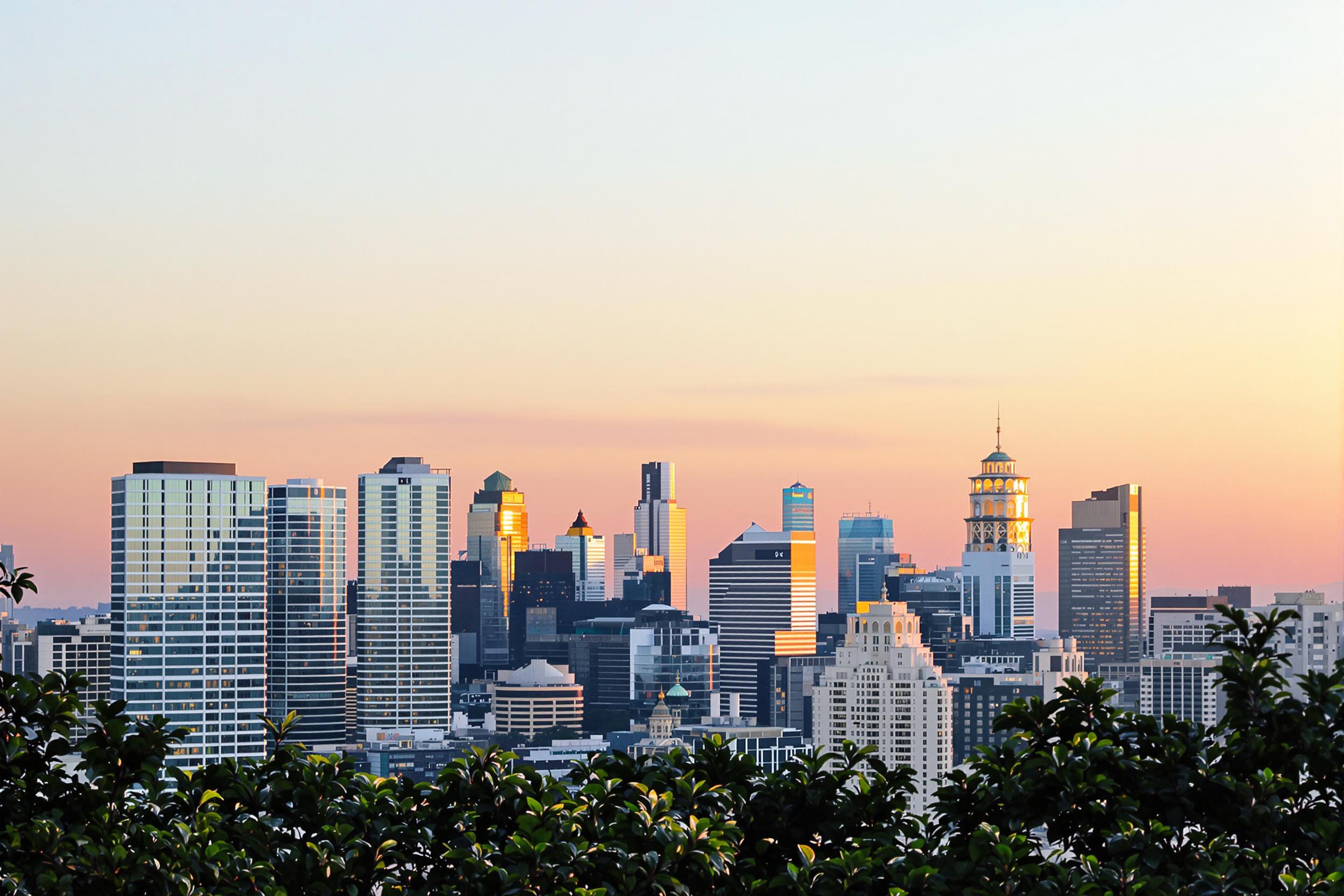 Vibrant Sunrise Over a Majestic City Skyline