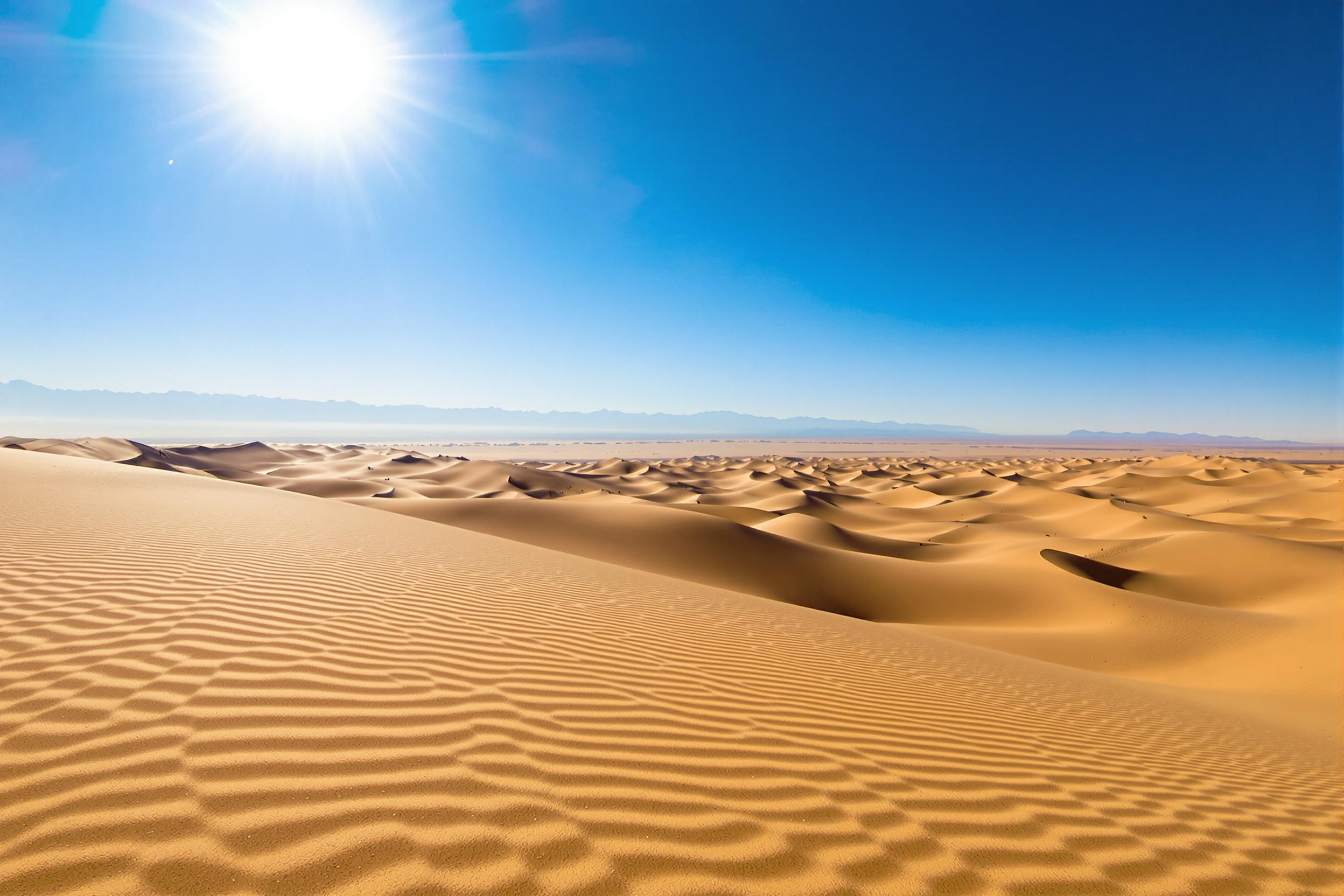 Panoramic Desert Landscape Under Intense Midday Sun