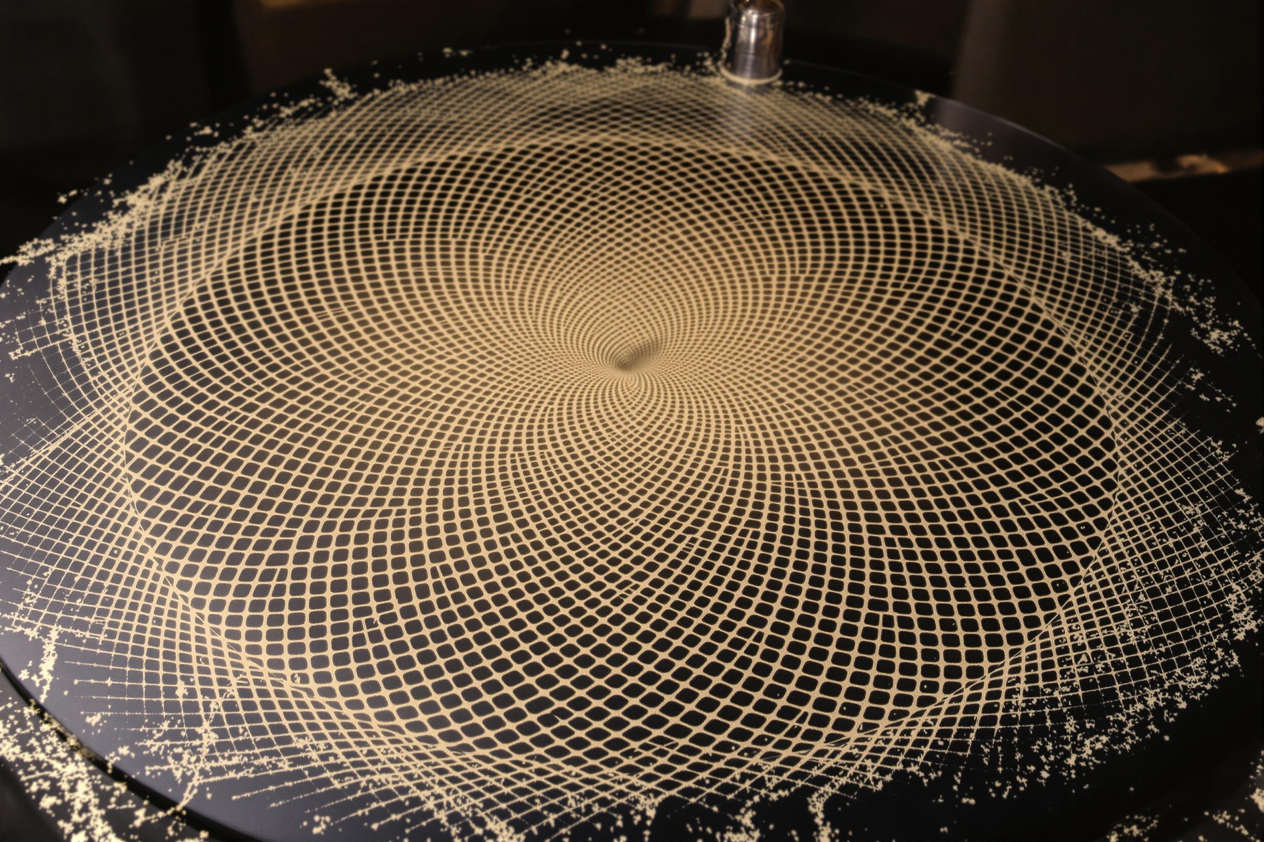 Sonic Waves Visualized: Sound Frequency Patterns in Sand