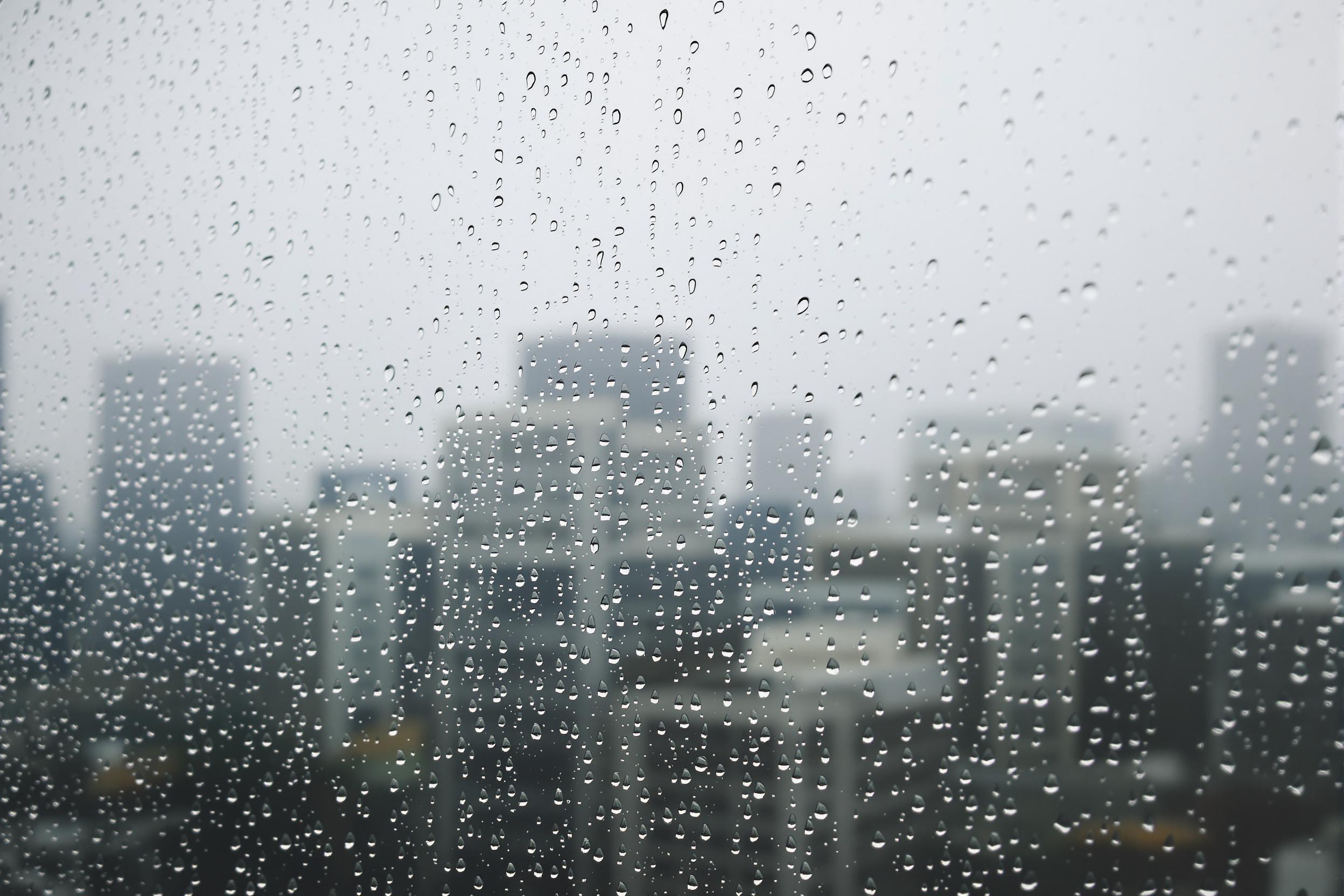 Macro Shot of Raindrops on a Window