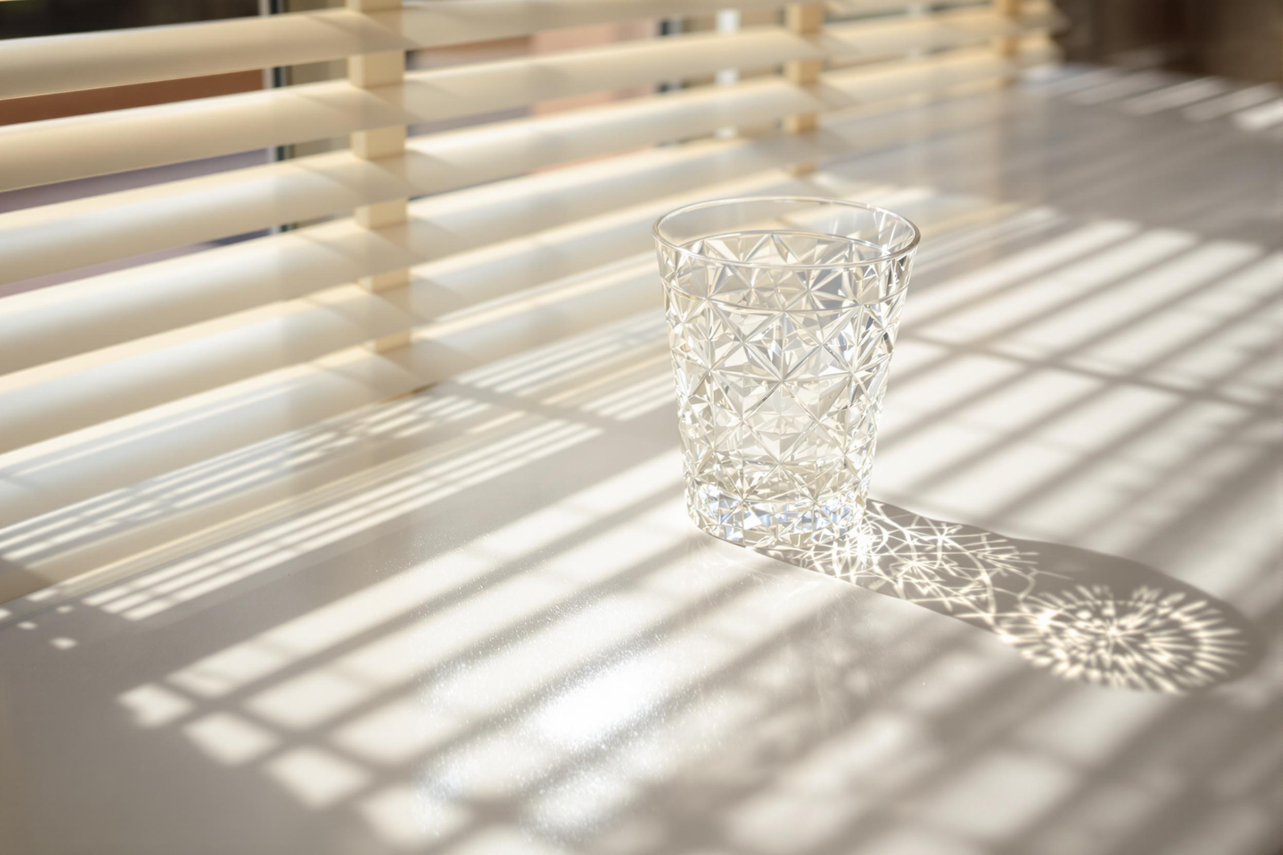 Textured Glass Tumbler on Minimalist White Surface