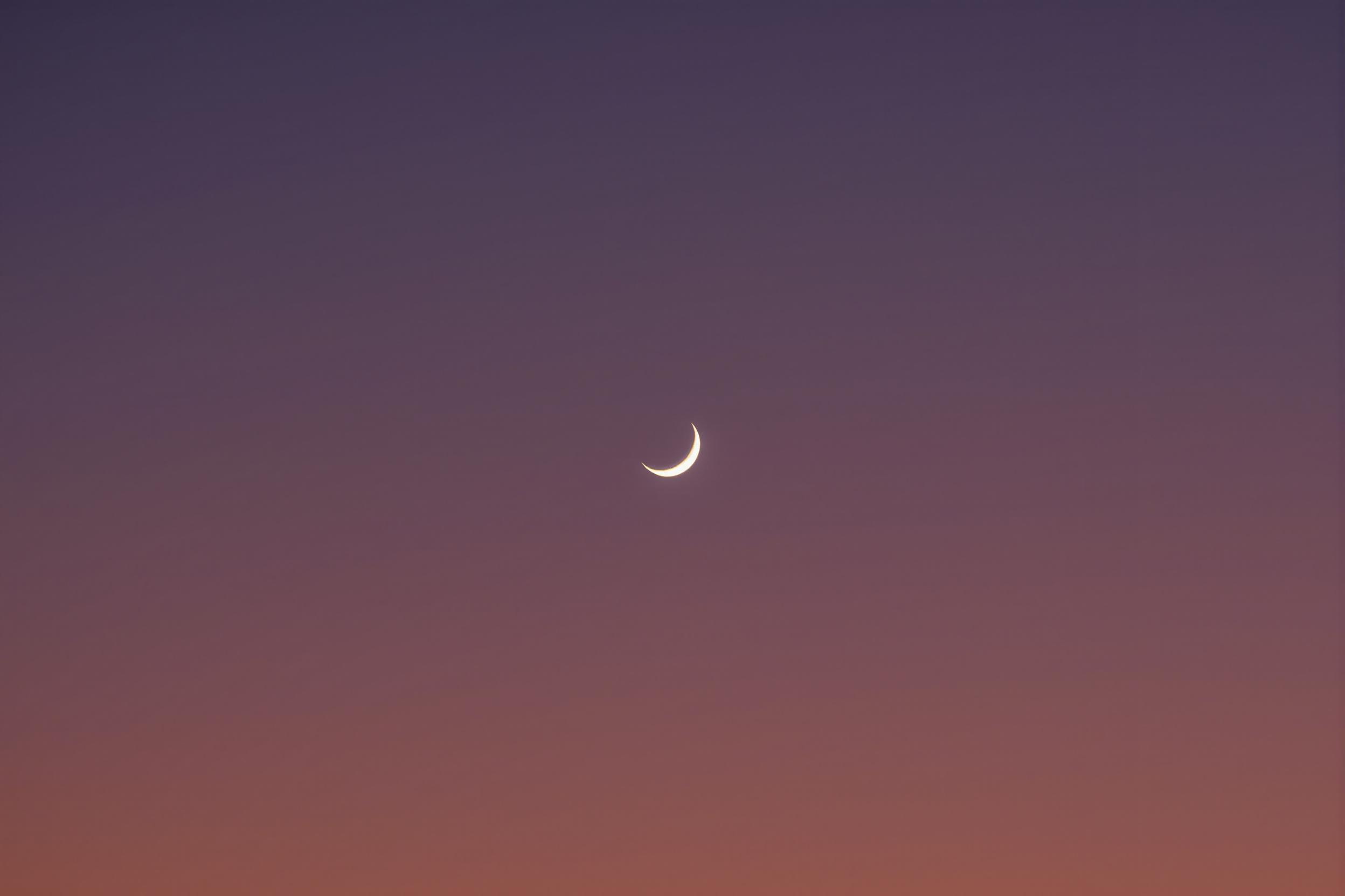 Minimalist Lunar Eclipse: Crescent Moon Silhouette