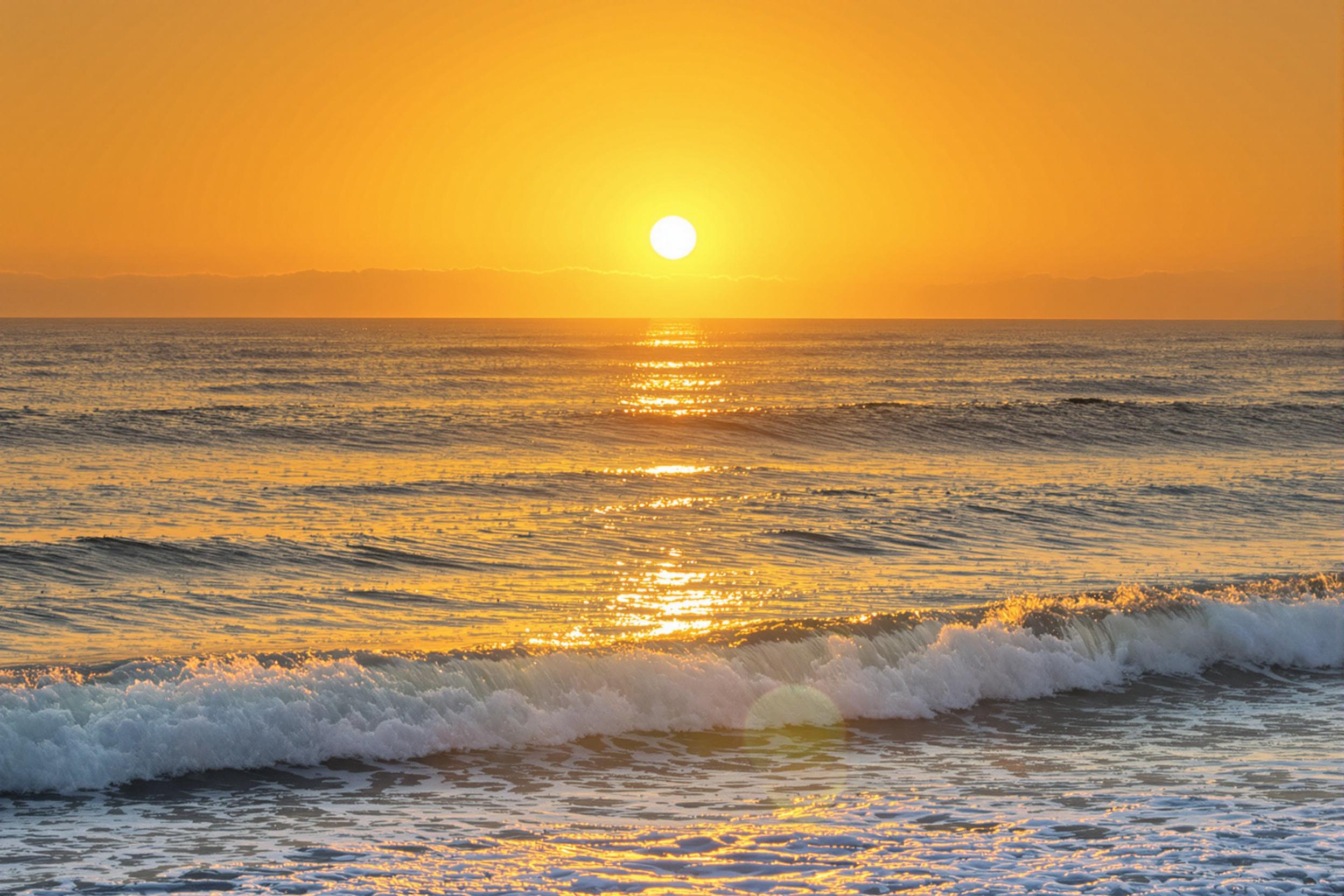 Majestic Sunrise Over Serene Ocean Waves